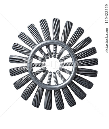 Metallic whisk in a circular arrangement creating a unique visual design. 129422269