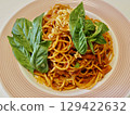 Tomato pasta with basil, my wife's homemade home cooking, dinner at home, happy family Title change 129422632