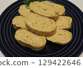 Rolled omelet, my wife's home-cooked meals, dinner at home, happy family Title change 129422646