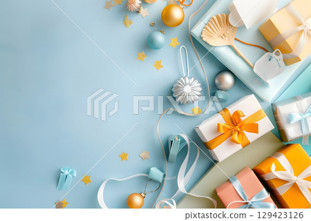 Colorful shopping items arranged with empty space for promotional text, ideal for marketing banners, sales ads, or social media. 129423126