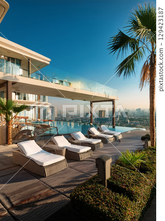 Stylish "resort hotel pool" 129423187