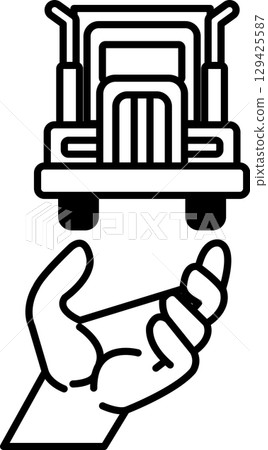 A hand is holding a truck 129425587