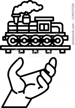 A hand is holding a train 129425589