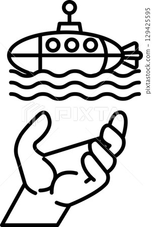 A hand is holding a submarine 129425595