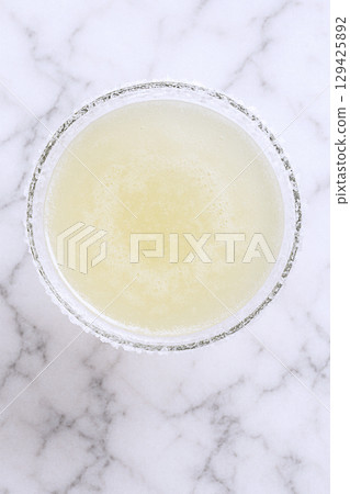 Margaritas on the table, top view 129425892