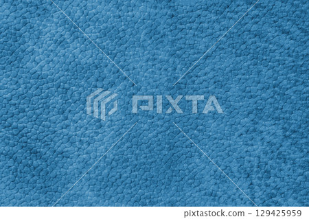 Close up, macro texture of blue suede, faux leather surface with natural pebble grain pattern Close up, macro texture of blue suede, faux leather surface with natural pebble grain pattern 129425959