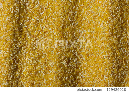Raw Yellow Corn Grits Close-Up Texture Raw Yellow Corn Grits Close-Up Texture 129426028