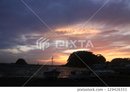 A beautiful sunset seen beyond Nishina Port A beautiful sunset seen beyond Nishina Port 129426331