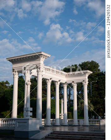 A European-style monument with white Corinthian columns standing out against the blue sky in Batumi, Georgia A European-style monument with white Corinthian columns standing out against the blue sky in Batumi, Georgia 129426532