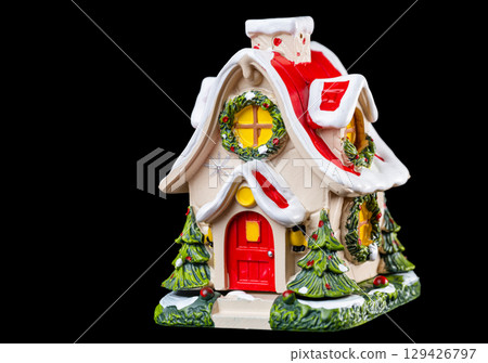 christmas house on black background 129426797