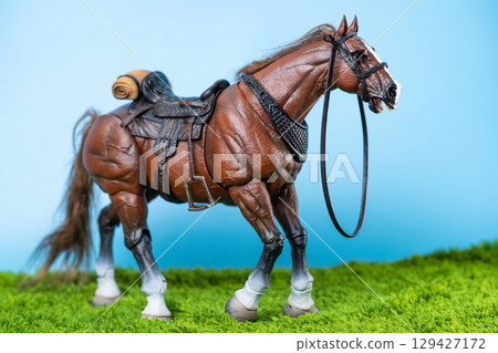 horses on green grass in studio horses on green grass in studio 129427172