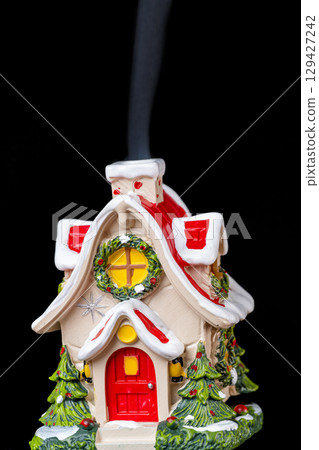 christmas house on black background 129427242