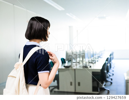 A woman touring the facility A woman touring the facility 129427659