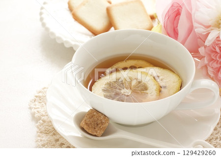 Langue de chat sweets and lemon tea Langue de chat sweets and lemon tea 129429260