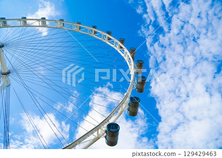 Partial composition of the Singapore Flyer against the blue sky 129429463