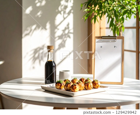 food for dinner on a table in a restaurant takoyaki food for dinner on a table in a restaurant takoyaki 129429942