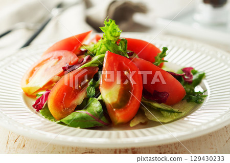 Mixed vegetable and tomato tossed salad Mixed vegetable and tomato tossed salad 129430233