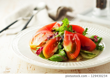 Mixed vegetable and tomato tossed salad Mixed vegetable and tomato tossed salad 129430234