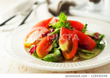 Mixed vegetable and tomato tossed salad Mixed vegetable and tomato tossed salad 129430346