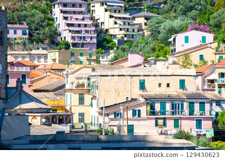 Colorful houses buildings. Monterosso Italian village. Cinque Terre old street architecture, Liguria, Italy. 129430623