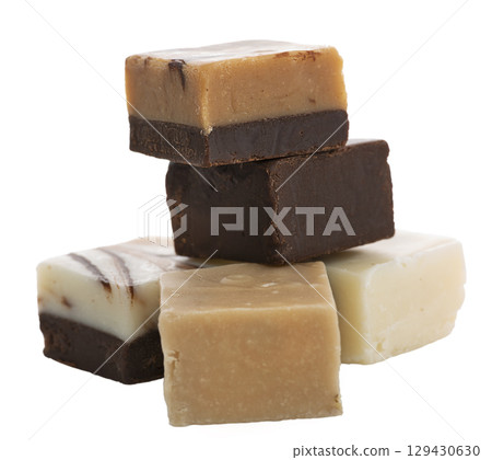Chocolate Fudge Squares isolated on white ,close up Chocolate Fudge Squares isolated on white ,close up 129430630