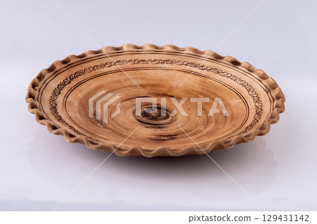 Brown Ceramic Plate dish on white background Brown Ceramic Plate dish on white background 129431142