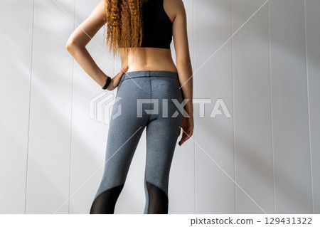 Woman in fashionable sportswear Woman in fashionable sportswear 129431322