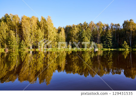 Tranquil River Reflections of Autumn Trees Tranquil River Reflections of Autumn Trees 129431535