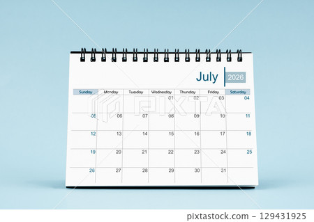 July 2026 Monthly desk calendar for 2026 year on soft blue color background. July 2026 Monthly desk calendar for 2026 year on soft blue color background. 129431925