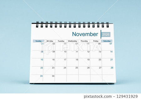 November 2026 Monthly desk calendar for 2026 year on soft blue color background. 129431929