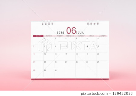 June blank desk calendar for 2026 year on pink color background. June blank desk calendar for 2026 year on pink color background. 129432053