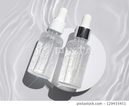 bottles with cosmetic cream 129433451