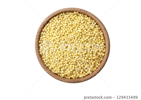 millet cereal in a plate isolated 129433499