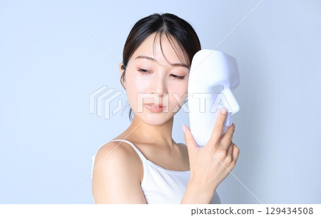 Woman with a mask Beauty image Woman with a mask Beauty image 129434508