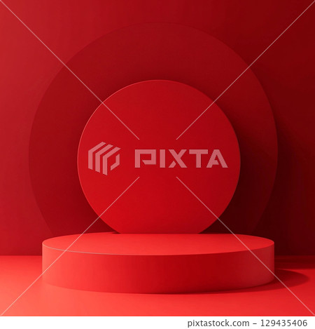 A vibrant circular red podium sits centered against red background, creating a bold, monochromatic, and theatrical display. 129435406