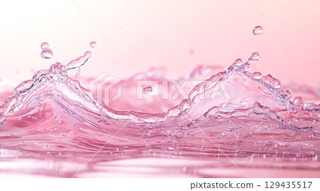 A vibrant splash of clear water creates a dynamic wave and delicate droplets on a calm, reflective pink surface, highlighting its translucent beauty. A vibrant splash of clear water creates a dynamic wave and delicate droplets on a calm, reflective pink surface, highlighting its translucent beauty. 129435517