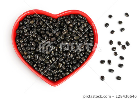Black bean or Urad dal, black gram, vigna mungo in ceramic bowl isolated on the white background. Top view. Flat lay. 129436646