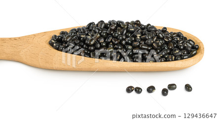 Black bean or Urad dal, black gram, vigna mungo in wooden spoon isolated on the white background 129436647