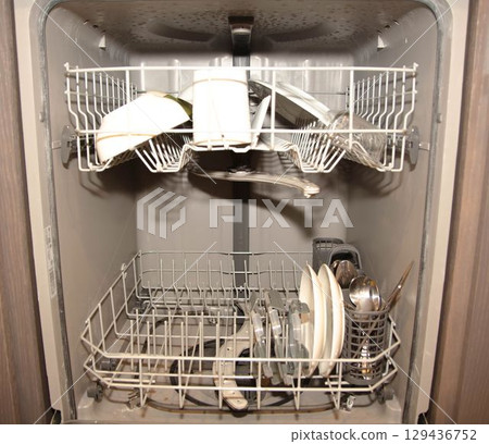 Dishwasher with Clean Plates and Glasses 129436752