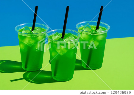 Refreshing Green Drinks with Ice Cubes 129436989