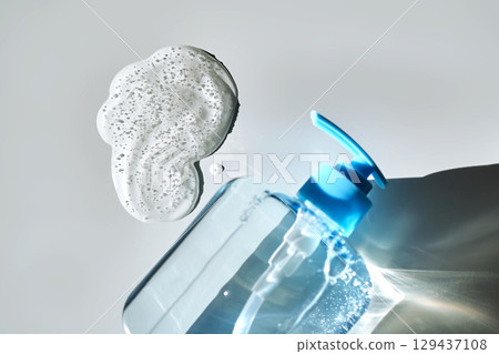 The texture of hand washing gel or dish washing gel on a white background. The texture of hand washing gel or dish washing gel on a white background. 129437108