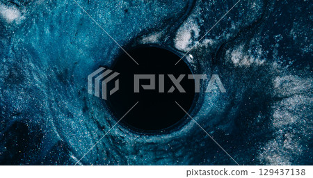 Ink particles. Blur glitter portal. Defocused blue color sparkling water circle frame liquid swirling on abstract art dark black background. 129437138