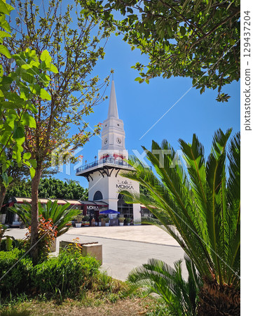 KEMER, TURKEY -  JULY 5, 2025 Beautiful view to Kemer Saat Kulesi today Cafe Mokka in the city centrum 129437204