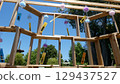 Wind chimes swaying in the wind 129437527