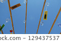 Wind chimes floating in the sky 129437537