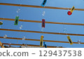 Wind chimes that shine in the blue sky 129437538