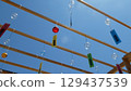 Wind chimes floating in the sky 129437539