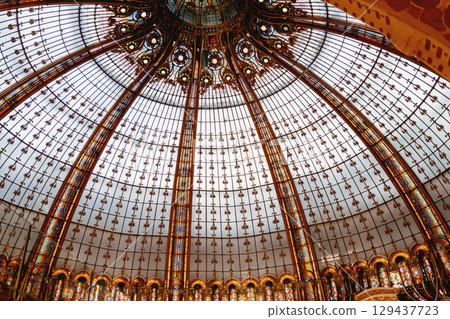 Glass dome of the luxury shopping mall Galeries La Fayette in Paris, France 129437723