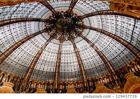 Glass dome of the luxury shopping mall Galeries La Fayette in Paris, France Glass dome of the luxury shopping mall Galeries La Fayette in Paris, France 129437729