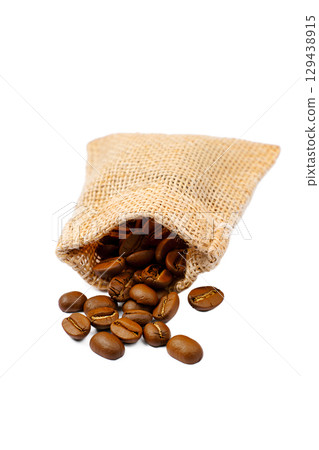 Coffee beans spilling from rustic burlap sack, fresh arabica beans isolated on transparent background Coffee beans spilling from rustic burlap sack, fresh arabica beans isolated on transparent background 129438915
